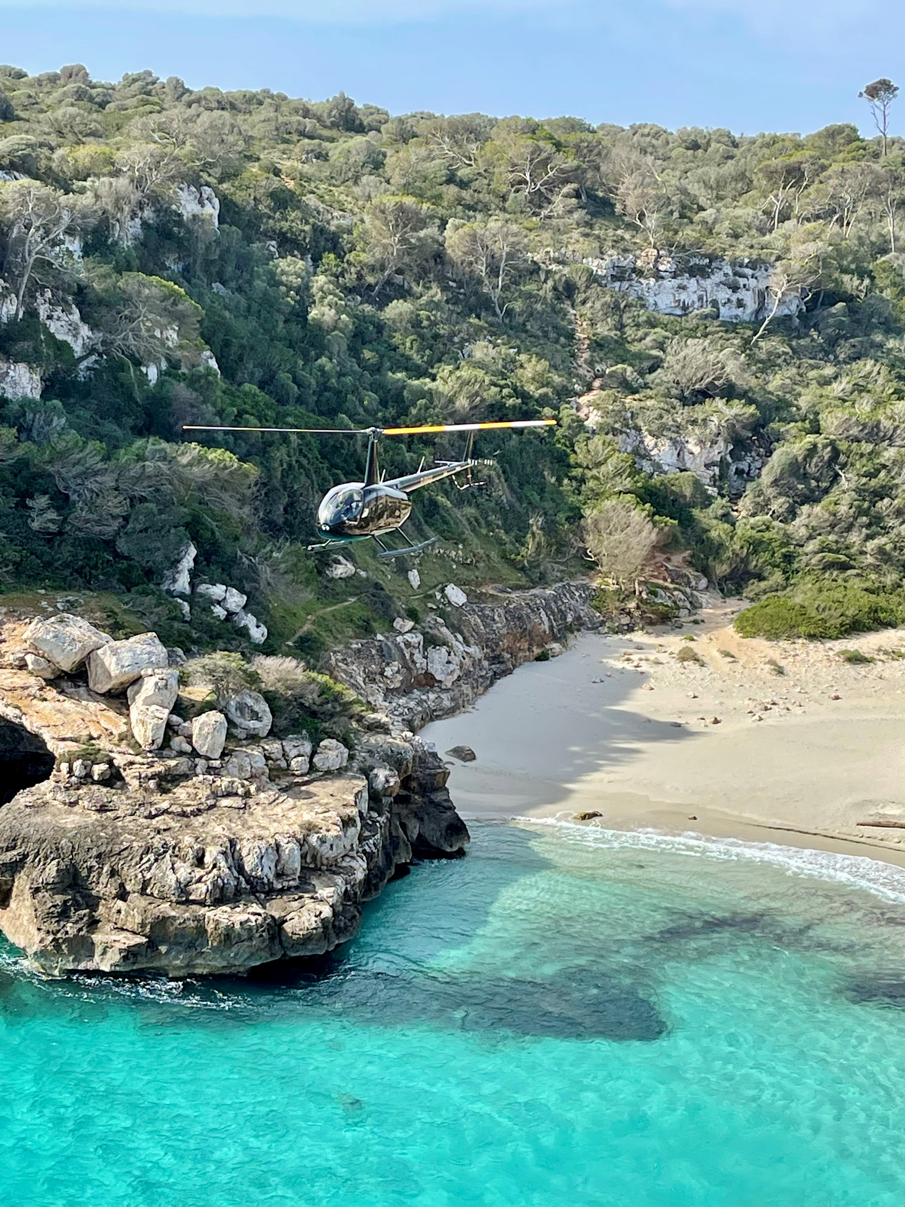 Helicopter Tours in Cala Blava photo 5