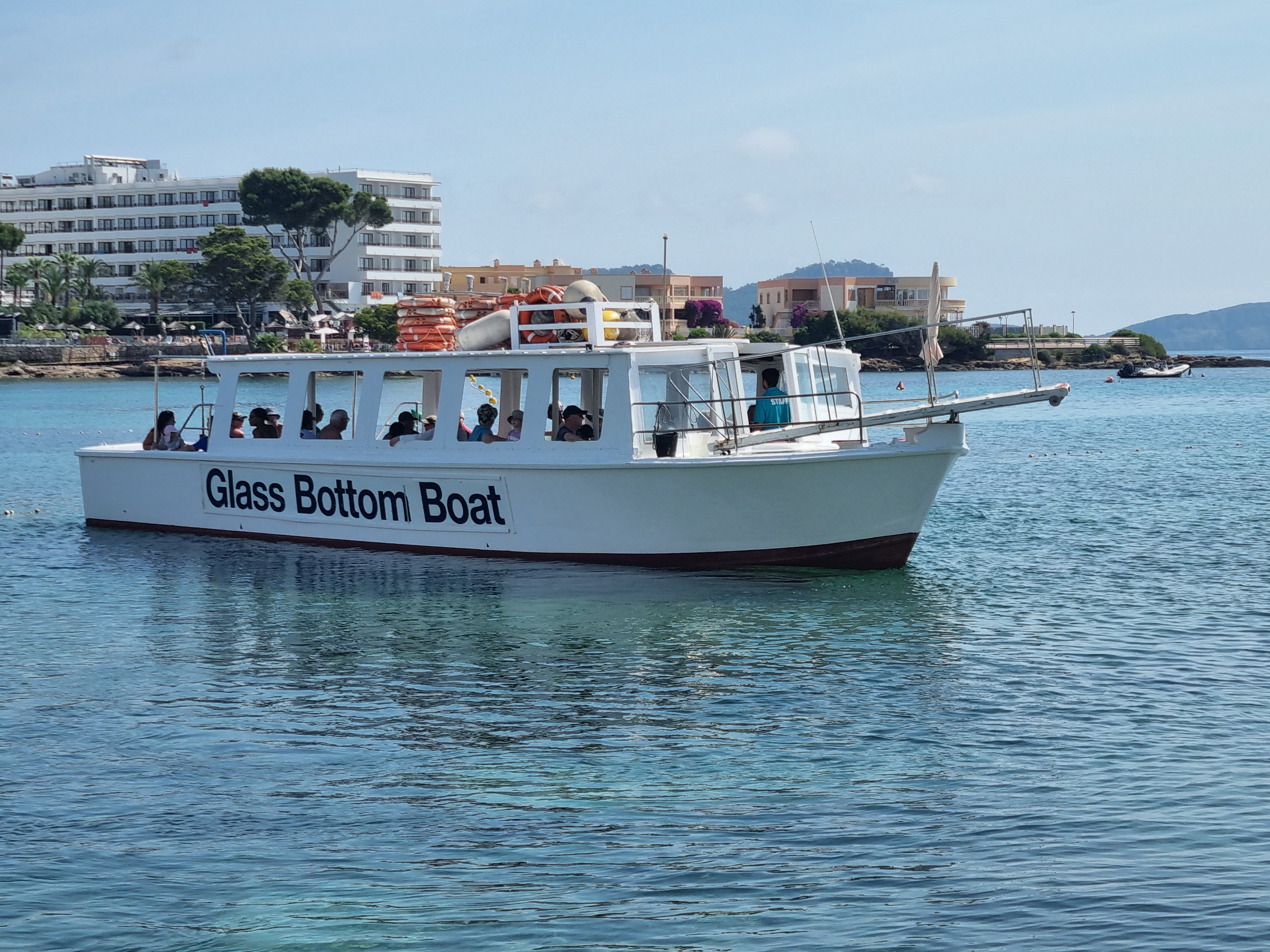 Glass Bottom Boat in Cala Tarida photo 2